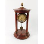 An HAC stained pine late 19thC portico clock, circular dial bearing Arabic numerals, the case with