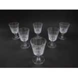 A set of six Thomas Webb cut glass wine glasses, decorated in the Kings Winford pattern.