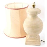 A classical design table lamp in polished stone, 37cm H, with shade.