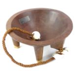 A carved Fijian ceremonial bowl, with rope and shell attachment, bearing presentation plaque