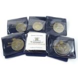 Five Guernsey five pound coins, a 2001 five pound proof, 2001 five pound silver proof, 1995, 1997