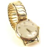 A 9ct gold Omega gents wristwatch, on expanding gold plated bracelet, marked to rear case W.White an