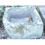 A corner hewn stone trough or sink, 42cm W.