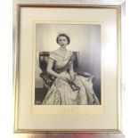 After Dorothy Wilding, Photographic portrait of Queen Elizabeth II, signed Elizabeth R, 1953, 34cm x