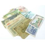 Sixty two foreign banknotes, various condition.