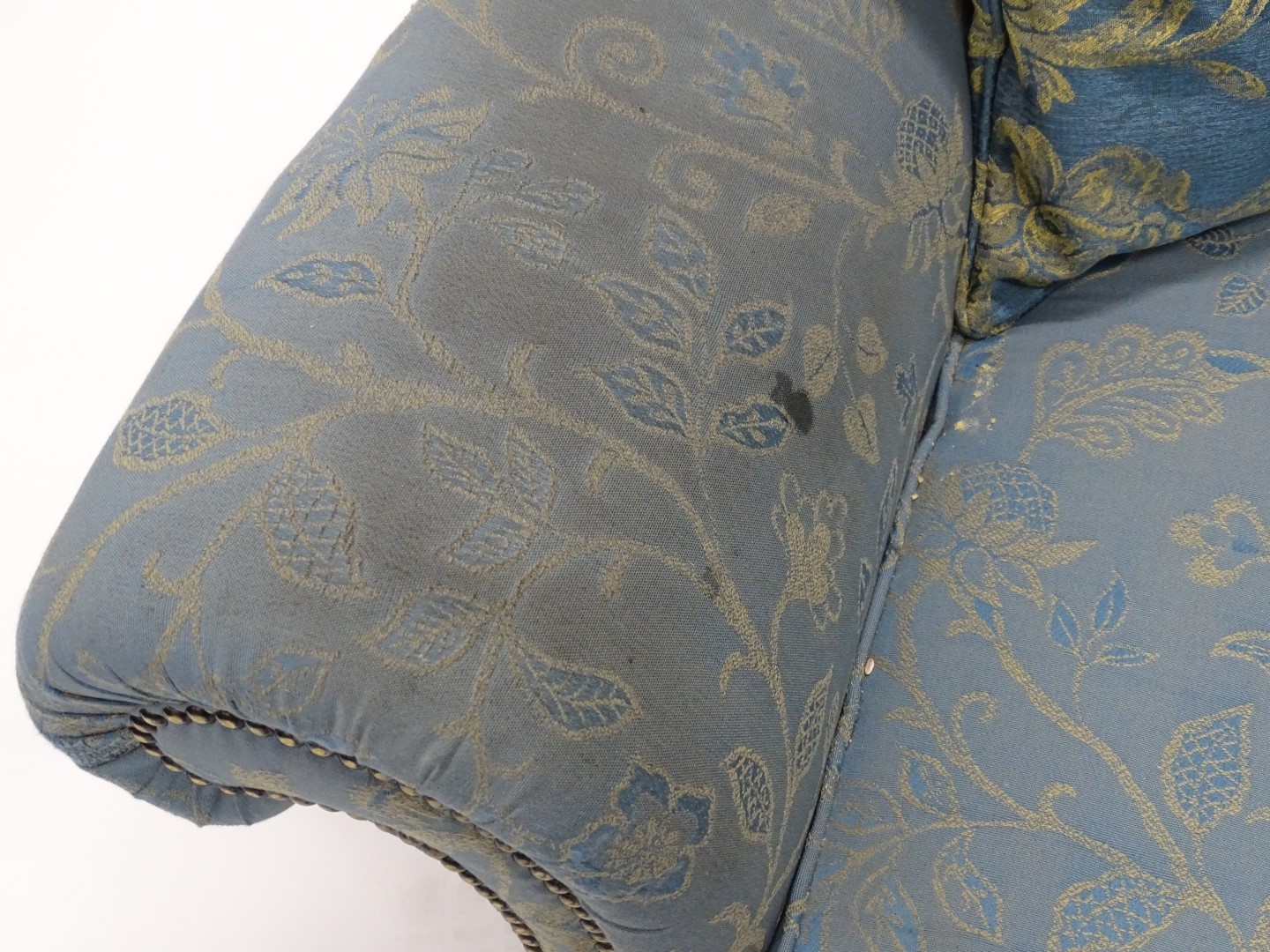 An unusual walnut wingback armchair, upholstered in pale blue and gold patterned fabric with studded - Image 2 of 3