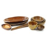 Tribal Art. A collection of Soloman Islands hardwood and mother of pearl bowls.