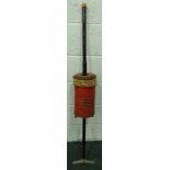 A Star bellows vacuum cleaner, painted in red and black with patent number 132cm L.