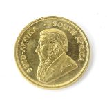 A 1983 fine gold Krugerrand, 1oz.