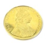 An Austrian fine gold 4 Ducat coin, marked 1915 (re-strike), 15g.