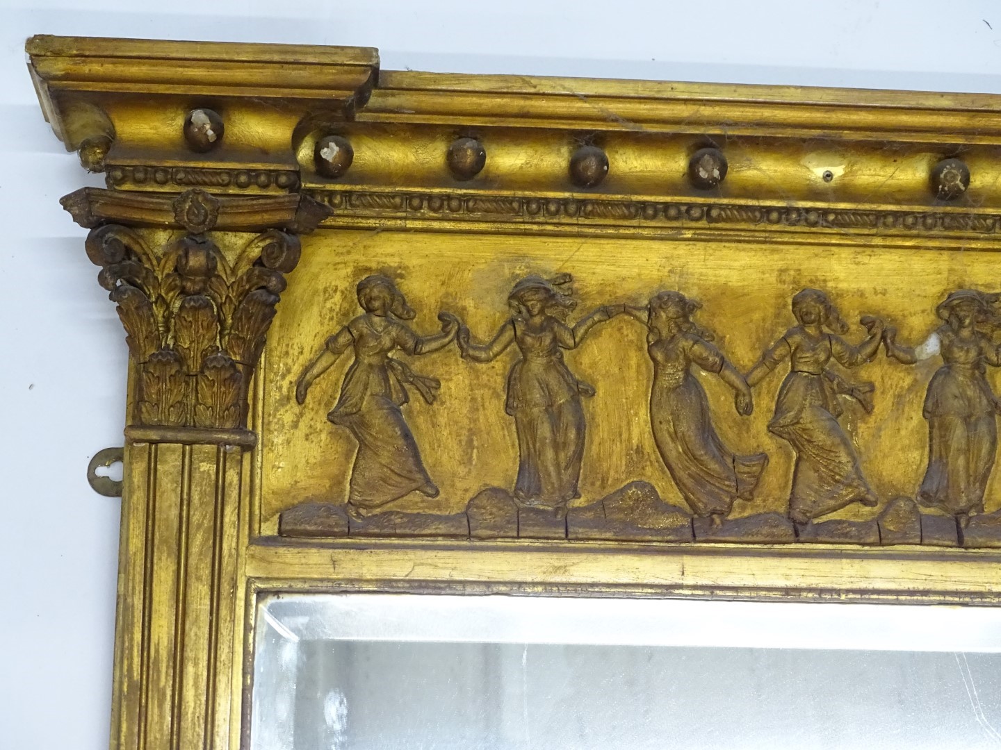 A 19thC gilt gesso over mantel mirror, with a break front top with a frieze decorated with neo - Image 2 of 3