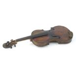 An early 20thC Berlin Stradivarius violin copy, with two piece back, of shaped outline, 59cm W (