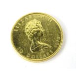 A 1979 fine gold Canadian Maple 50 dollar, 1oz.