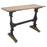 An early 20thC pub table, the rectangular mahogany top with a moulded edge on a ebonised and gilt