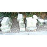 A quantity of hewn stone, various sizes, mainly rectangular, the largest piece approx 49cm L.