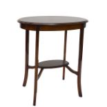 An Edwardian mahogany and chequer banded oval occasional table, the quarter veneered top with