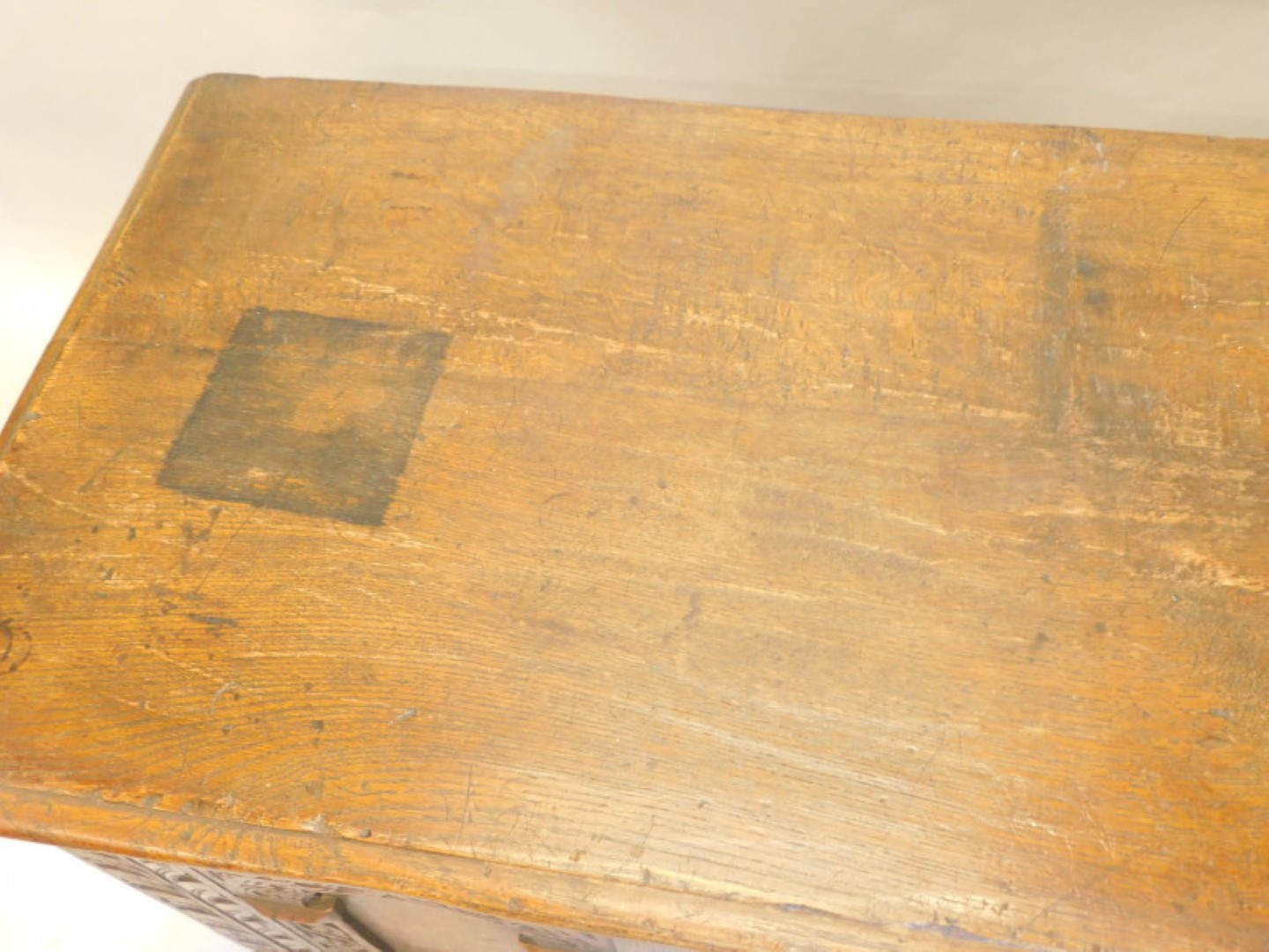 A late 17thC/early 18thC oak coffer, with a carved frieze above arcaded panels, on style supports, - Image 2 of 3