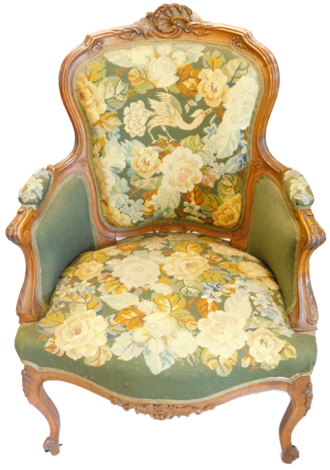 A 19thC French mahogany armchair, the show-frame carved with scrolls, flowerheads etc., with a