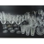 A large quantity of cut glass, a claret jug, wine glasses, tumblers etc.