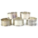 Five various plain silver napkin rings, various dates and assays, 2oz overall.