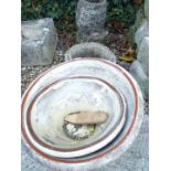 A collection of garden items, to include a barrel shaped moulded jardiniere, a small stone sink