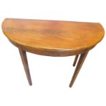 A 19thC mahogany D-shaped table, with a figured top on channelled tapering legs, 109cm W.