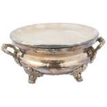 A Continental late 19thC silver plated food warmer, with a pair of embossed vine handles, raised
