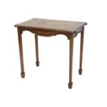 A Continental fruitwood side table, with a double boxwood strung border above a moulded shaped apron