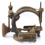 A Victorian sewing machine, incomplete, 24cm W. (AF)