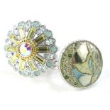Two Swarovski crystal set dress rings, silver plated, one in the form of a floral cluster, with