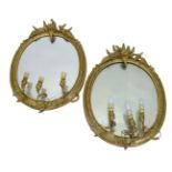 A pair of 19thC gilt girandoles, each decorated with flowers, ferns, etc., later converted to