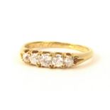 A five stone diamond ring, set with five round brilliant cut diamonds in claw setting with pierced