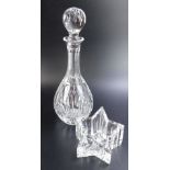 A Waterford Crystal decanter, with cylindrical stem, cut glass repeat bulbous body, with orb