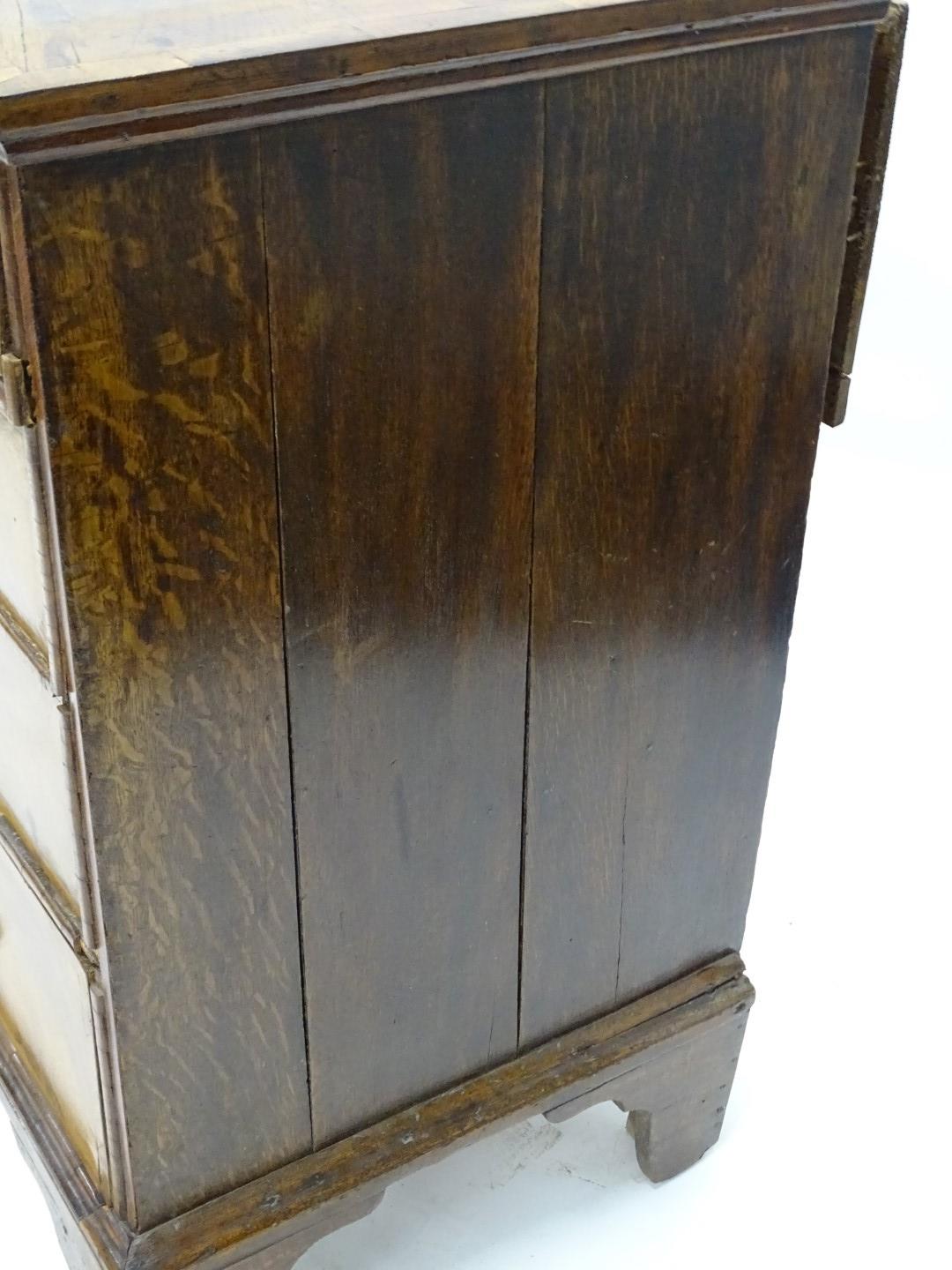 A mid 18thC walnut chest of drawers, the quarter veneered top with a crossbanded border, above two - Image 2 of 5