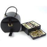 A black leather jewellery box and contents, to include silver dress rings, silver chain, earrings,