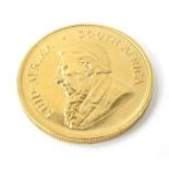 A 1979 fine gold Kruggerand, 1oz.