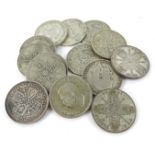 A collection of fourteen pre 1956 two shilling coins, 155g overall.