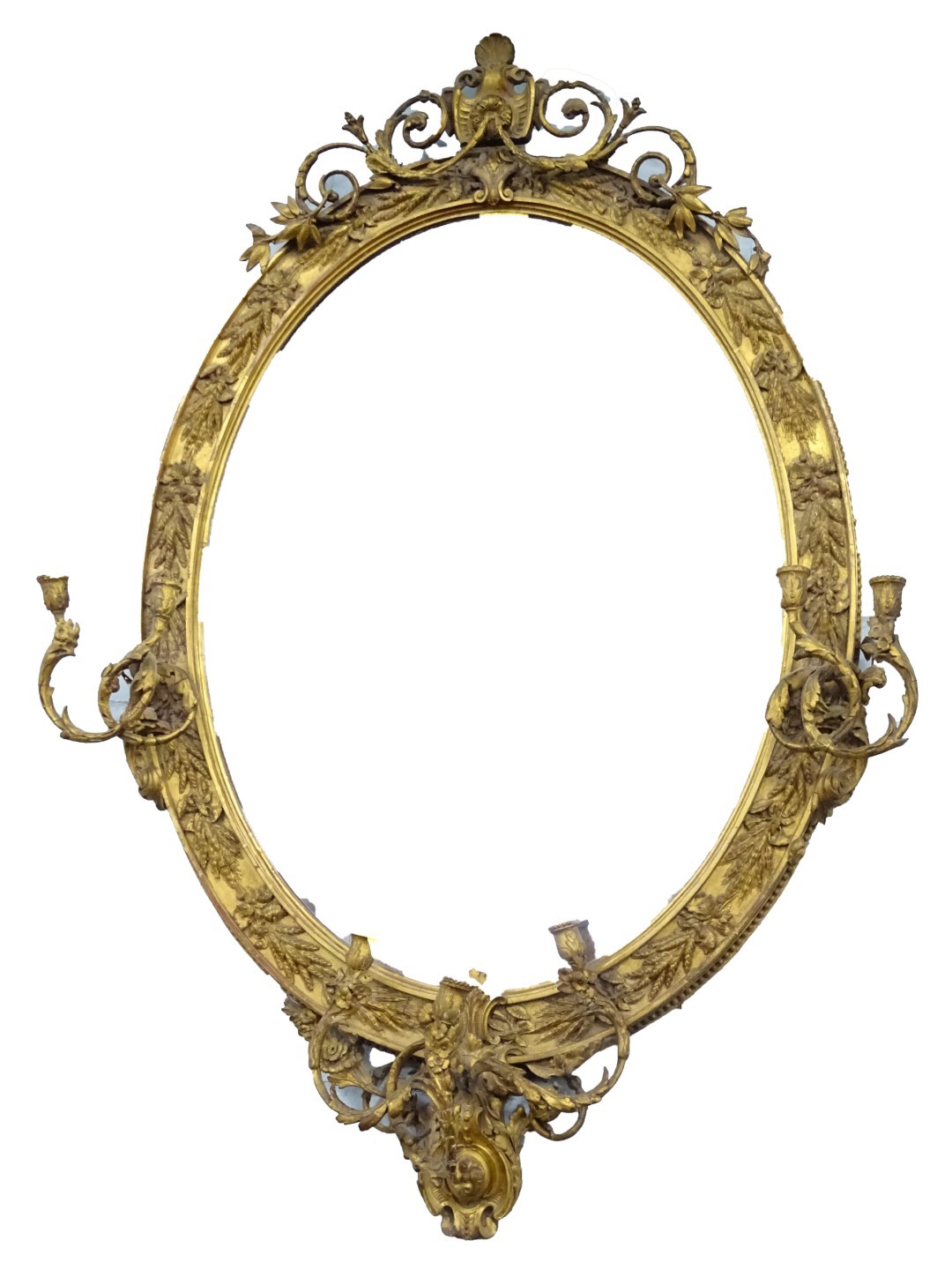 A Victorian oval girandole wall mirror, decorated with wheat ears, flowers, etc., with an