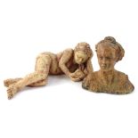 A terracotta sculpture of a reclining nude female reading, 39cm W, and a bust of a lady. (2)