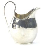 An Elizabeth II silver milk jug, with a reeded border and tapering handle, Birmingham 1985, 5¼oz,