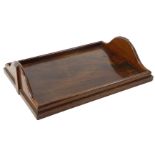 A 19thC rosewood tray, of rectangular outline, with shaped handles, 10cm H, 35cm W, 225cm D.