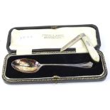 A Victorian fruit knife, with silver blade and mother of pearl handle, and a christening spoon in