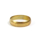 An 18ct gold wedding band, of polished plain design, 4.7g.