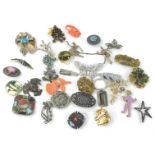 Costume jewellery brooches, to include bamboo enamel design brooch, silver cherubs brooch, 60s and