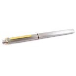 A Must de Cartier fountain pen, in brushed metal, with gold plated mounts, number to underside