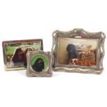 A collection of photograph frames, to include a silver mounted small example and two silver plated