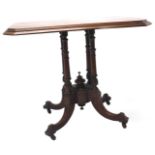 A Victorian mahogany occasional table, the rectangular top with canted corners, on four spindle