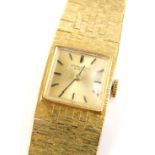 A mid 20thC International Watch Company (IWC) 18ct gold ladies wristwatch, with articulated bark