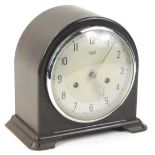 A Smiths of Enfield mantel clock, in a brown Bakelite arched case, 20cm H.
