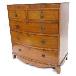 A Victorian oak and mahogany crossbanded bow fronted chest, with two short and three long drawers,